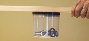 Turn a CD or DVD container into a holder for spare parts