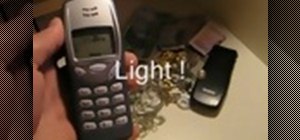 Hack a cell phone to add a light sensitive alarm