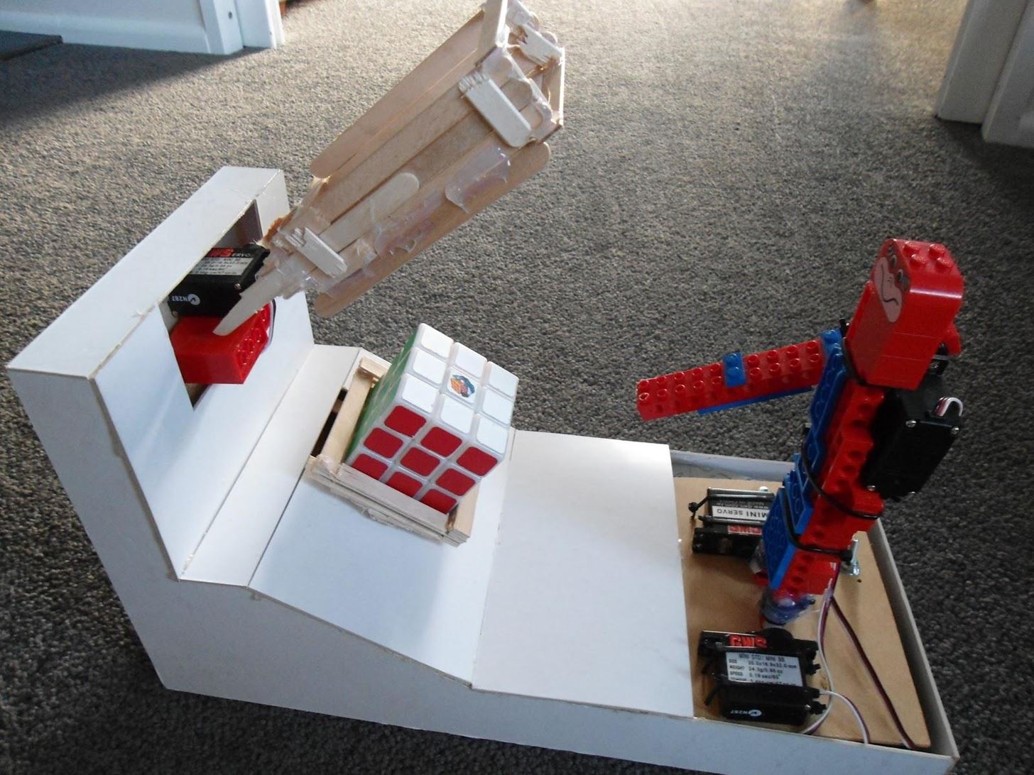 This Simple LEGO and Popsicle Stick Robot Can Solve a Rubik's Cube in 100 Moves or Less