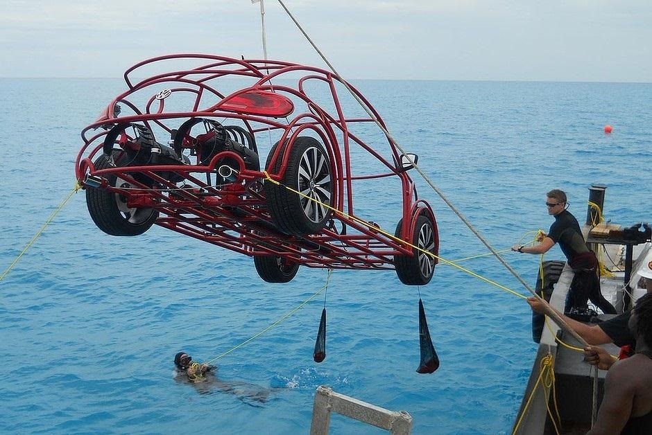 Volkswagen's Underwater 'Car' Cage Lets Divers Get Up Close and Personal During Shark Week